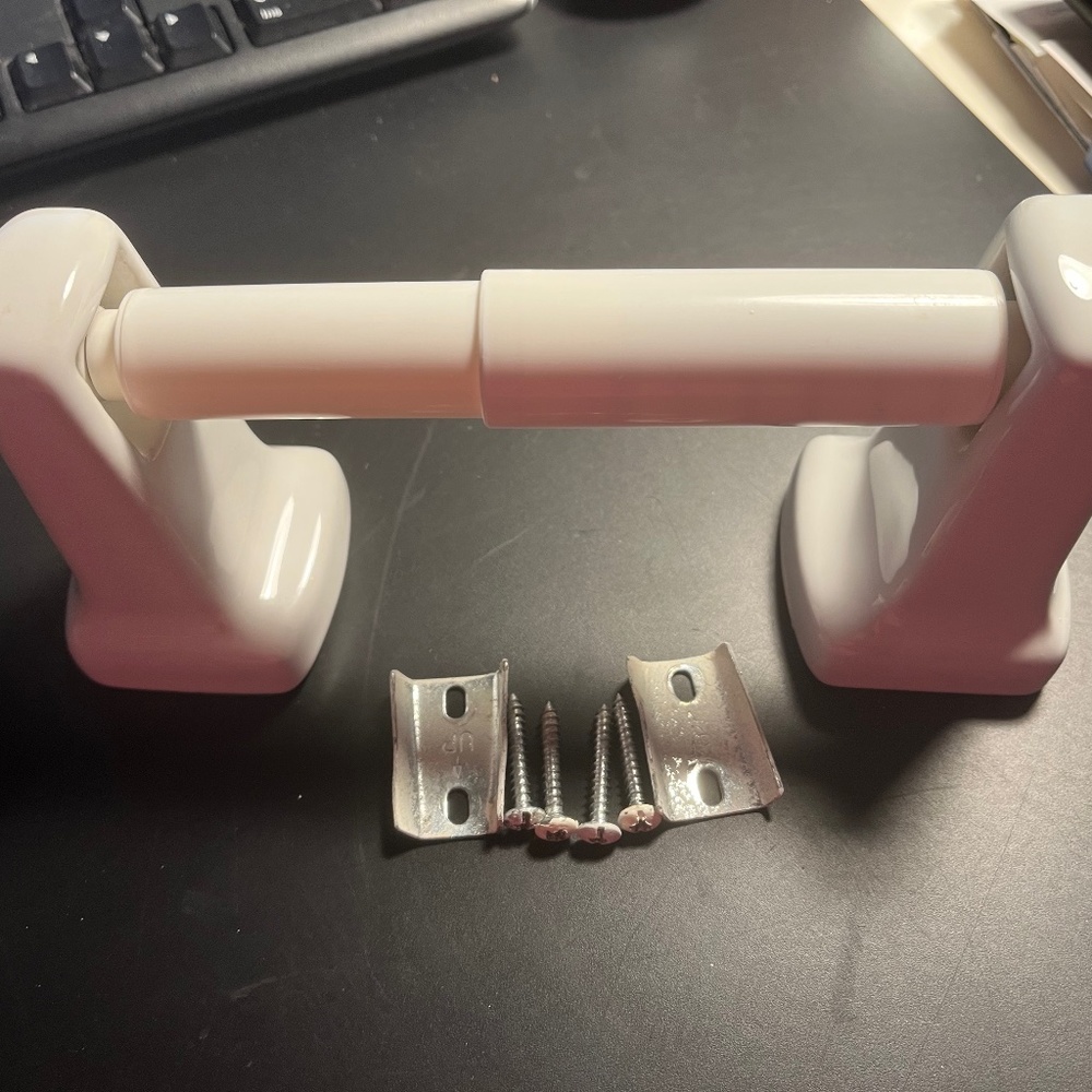 Porcelain toilet paper holder